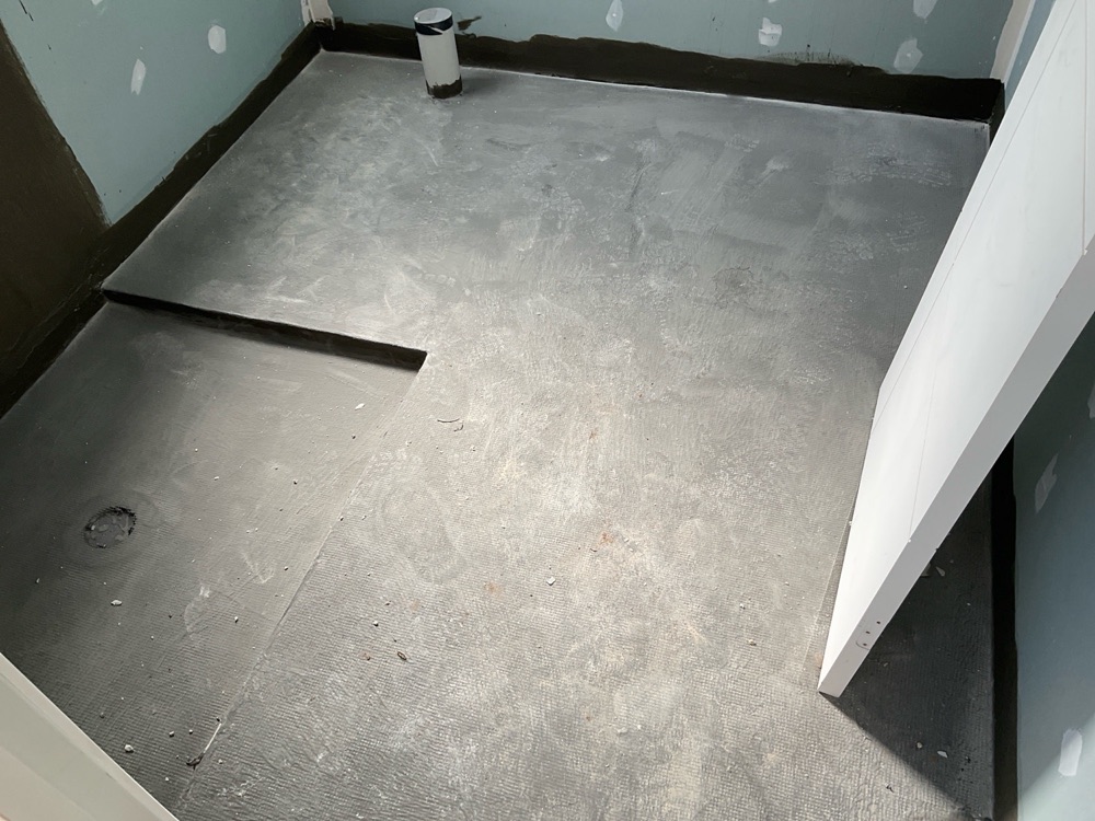 Membrane not protected from physical or chemical damage, recorded during a waterproofing inspection in Point Cook